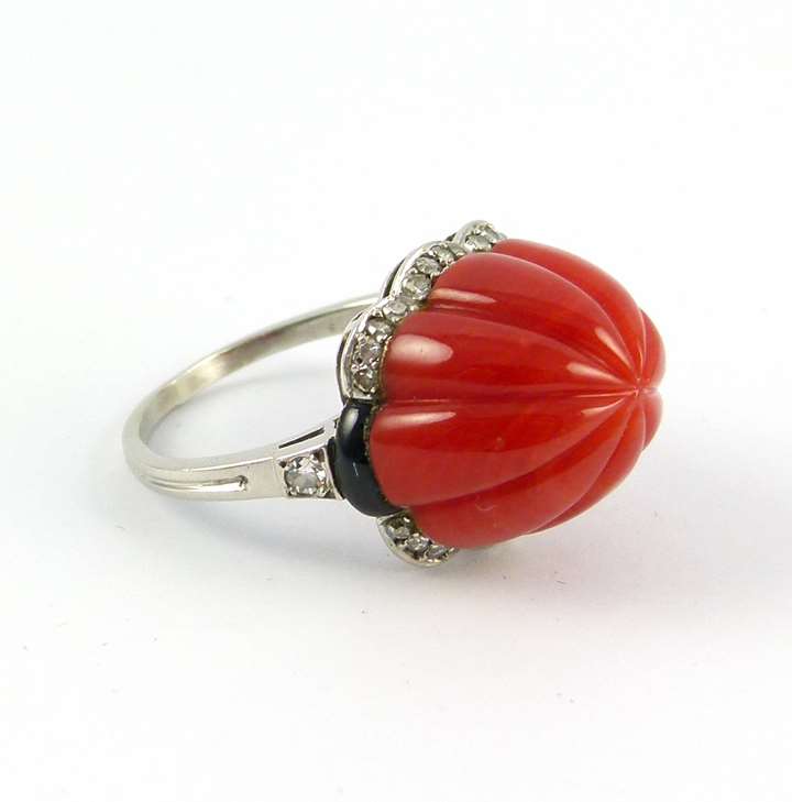 Carved sugarloaf stone and diamond ring